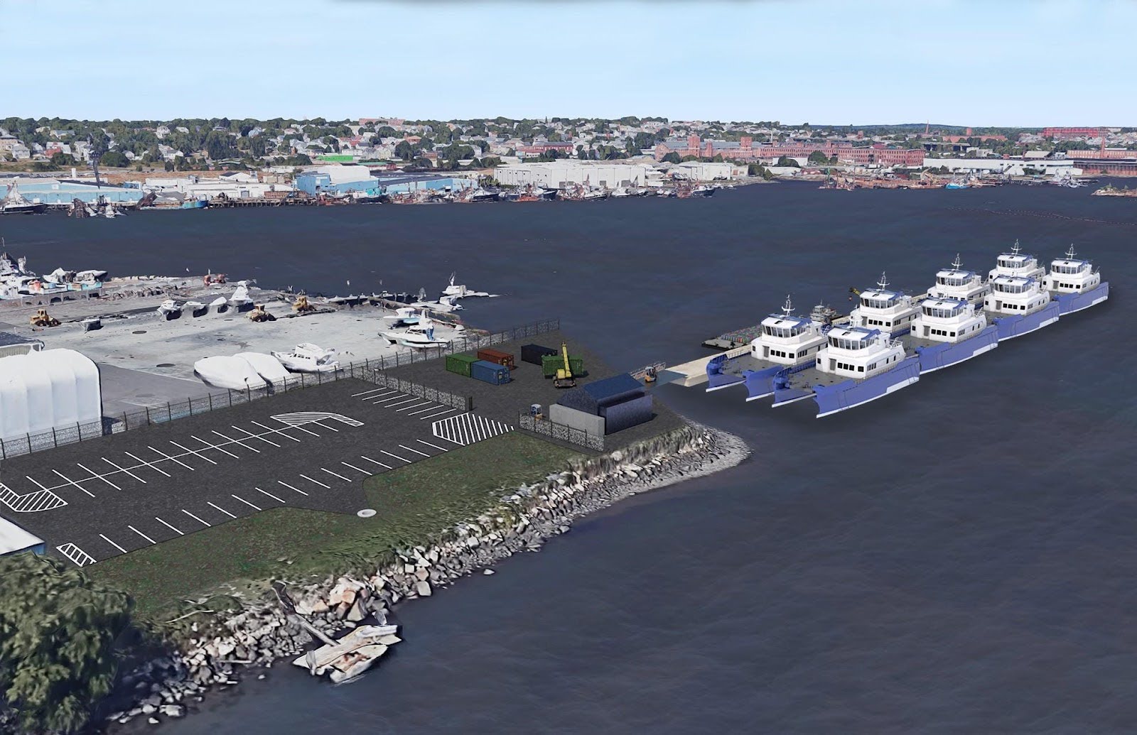 A waterfront area with several ferries docked at a pier, a parking lot with marked spaces, boats on land, and buildings visible across the water in the background.